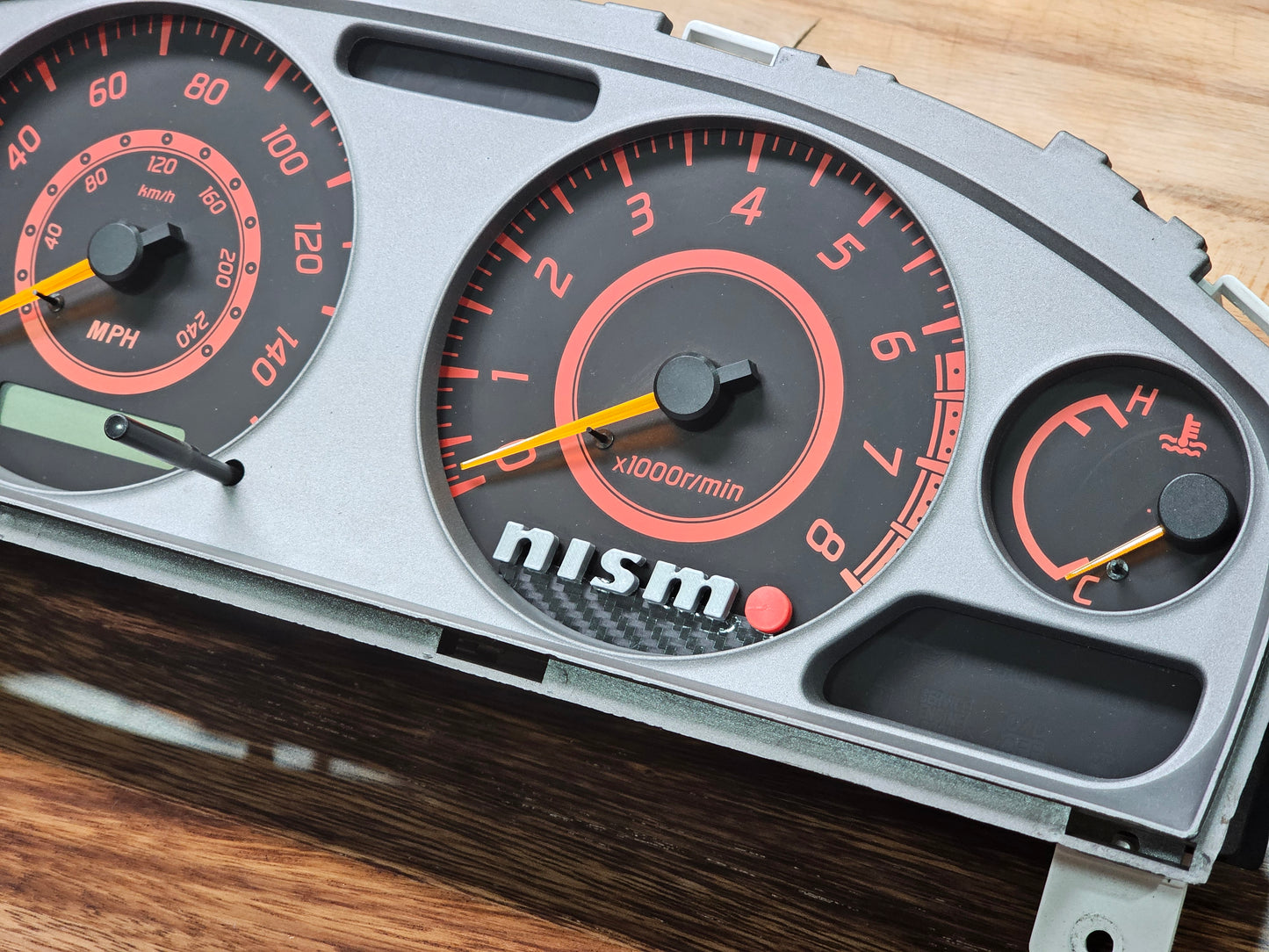 02-06 sentra "Nismo" cluster emblem