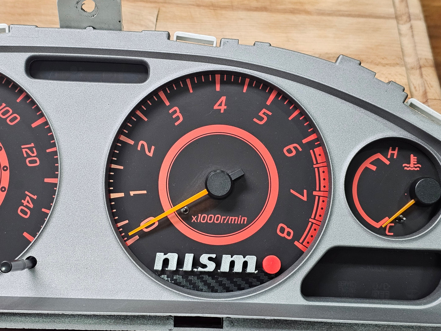 02-06 sentra "Nismo" cluster emblem