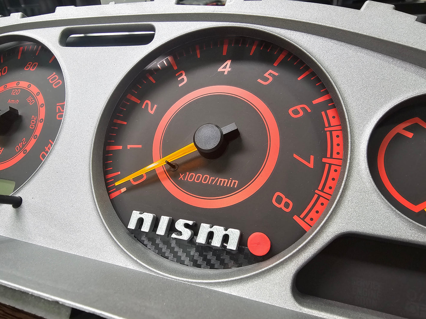 02-06 sentra "Nismo" cluster emblem