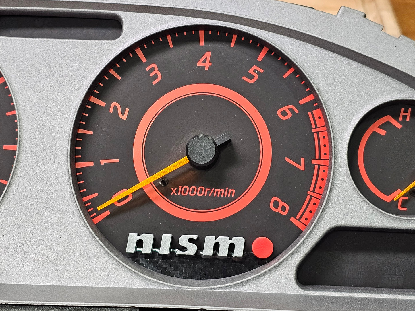 02-06 sentra "Nismo" cluster emblem