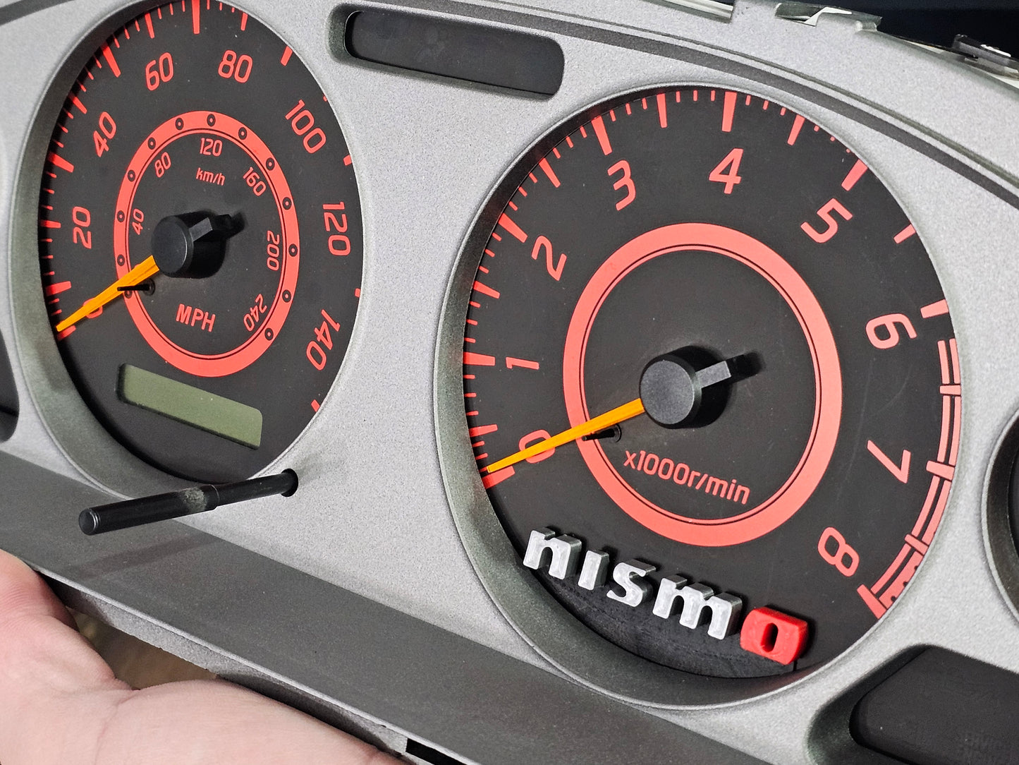 02-06 sentra "Nismo" cluster emblem