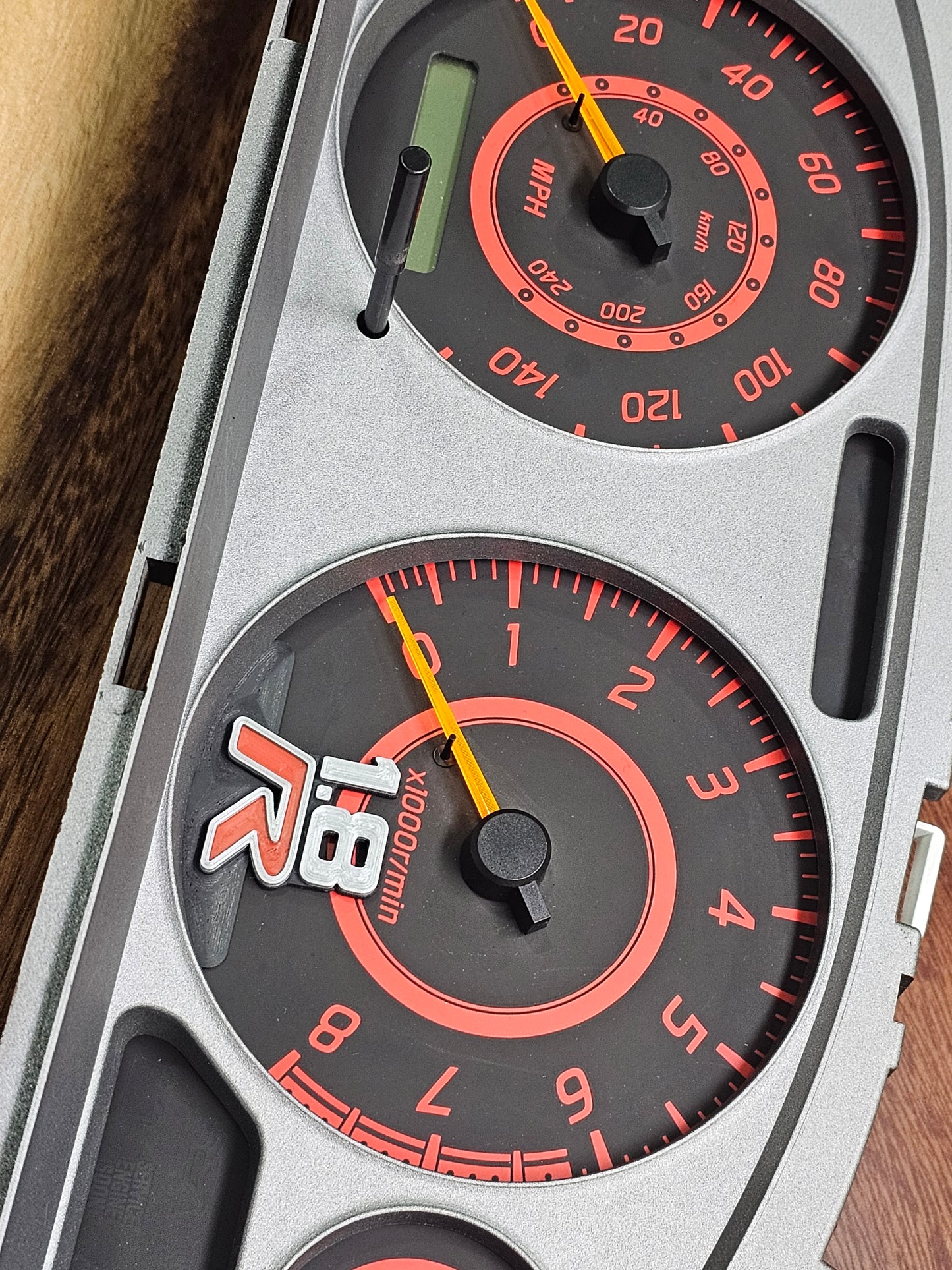 1.8-R cluster emblem